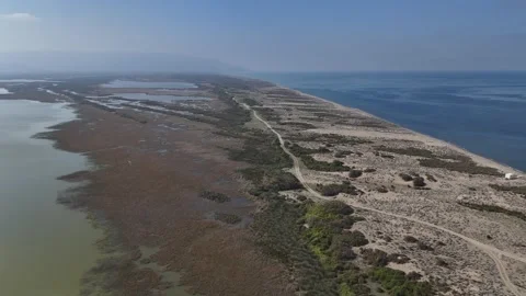 A Drone's Expansive View of a Slender Peninsula Stock Footage 314218215