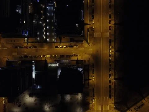 Drone's eye on quiet streets in Madrid illuminated by Lampposts Stock Photos