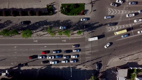Drone's Eye View - Aerial view of downtown traffic on the freeway on a sunny day Stock Footage 108106171