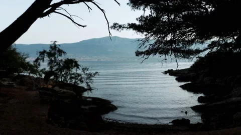 Drone's-eye view: from dark tunnel to bright blue sea Video stock 220842153