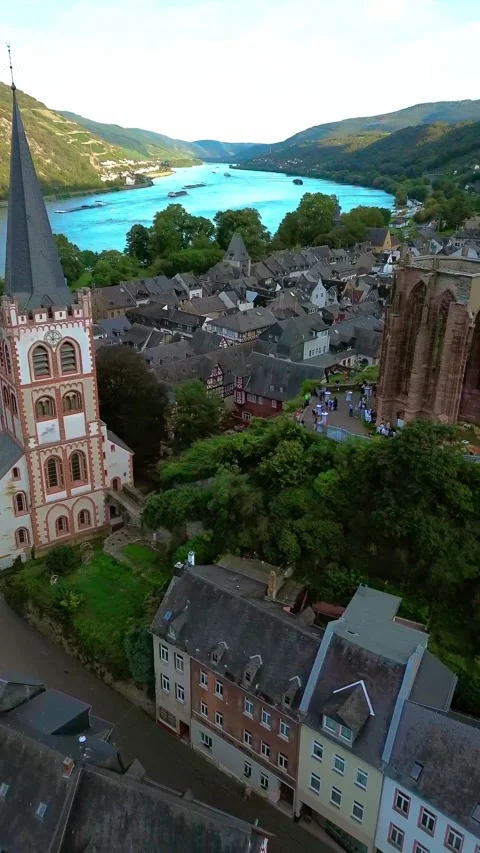 A Drone's Eye View of a Medieval Town by the River Stock Footage 249616948