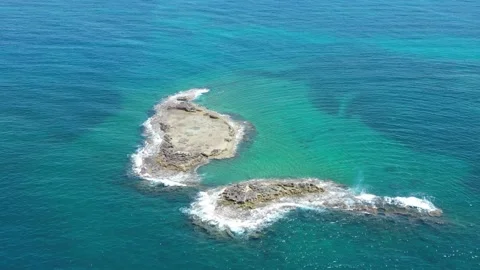 A Drone's Eye View of a Vibrant Coral Reef Island Video stock 240182560