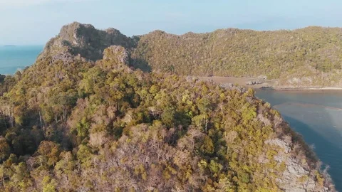 The drone's flight over the cliffs, smoothly overlooks the small bay Stock Footage 106823983