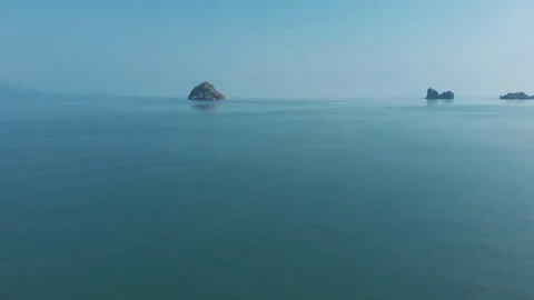 A drone's flight over the Strait Of Malacca. Wild Beach, Langkawi, Malaysia Stock Footage 106809070