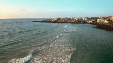 Drones flying across the ocean towards the beach. Jeju Island, South Korea Stock Footage 116430144