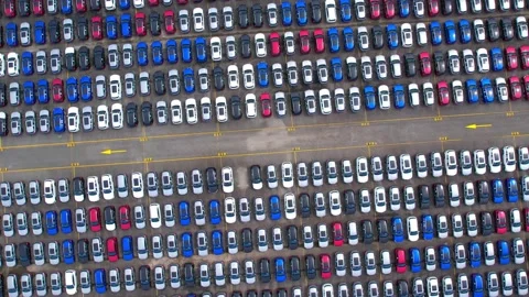 Drones flying over of many vehicles at parking lots Stock Footage 210794364