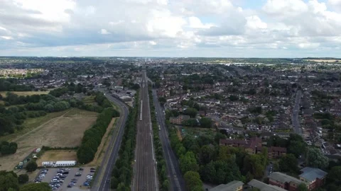 Drone's footage of Fast Train moving on Tracks at England Stock Footage 207945113