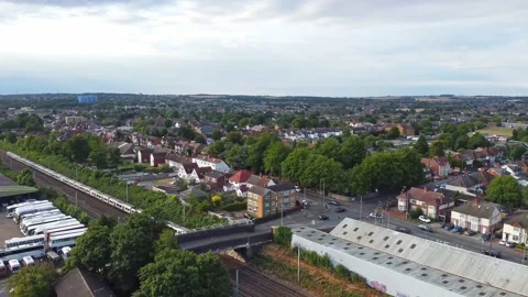 Drone's footage of Fast Train moving on Tracks at England Stock Footage 219515460