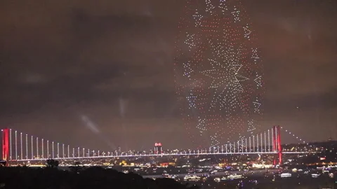 Drones form presidential flag over Bosphorus Bridge 29 Oct 2023 100 anniversary Stock Footage 254761628