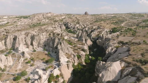 A Drone's Journey Over Rose Valley Unveiling Wonders of Cappadocia, Turkiye Stock Footage 251997754