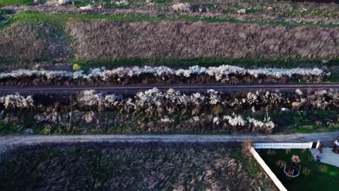 A drone's perspective of railways next to a village Video stock 272993509