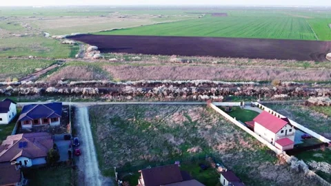 A drone's perspective of railways next to a village Video stock 272993517