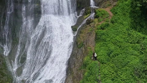 Drones shoot perfect waterfalls in the mountains Stock Footage 311749628