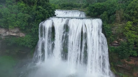 Drones shoot waterfalls with rainbows Stock Footage 311749595