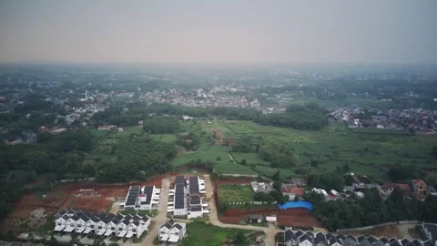 Drone's View: Roadside Glimpse of Nature's Forests and Residential Bliss Stockbeeldmateriaal 243973809