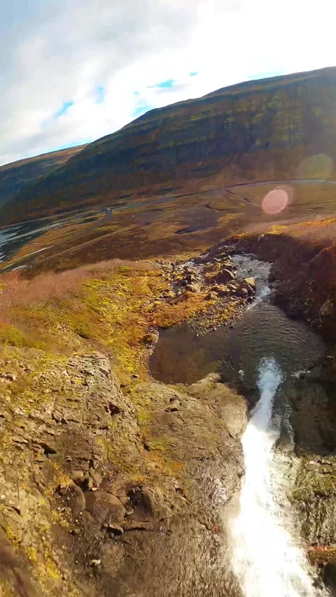 Droneshot climbing a waterfall vertical Stock Footage 247270000