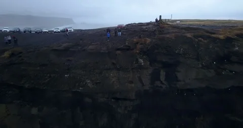 Dronie on the Cliffs of Dyrhólaey, Iceland Stock Footage 90971055