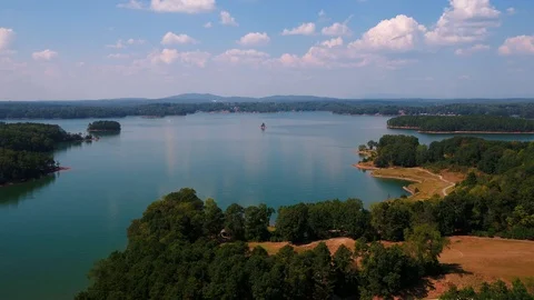Droning over Lake Lanier in Georgia with mountains in the background. Stock Footage