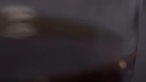 Drop of black coffee in cup of coffee machine in slow motion Stock Footage 199472758