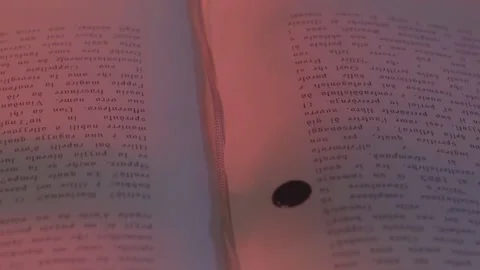 A drop of blood falls on a book of magic Vídeo Stock 160860237