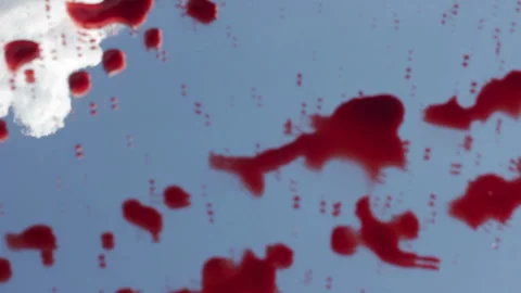 A Drop Of Blood On A Sky Background Video stock 91210231