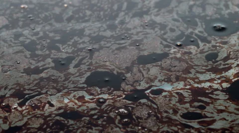 Drop of blue oil paint falling in water Stock Footage 46665740