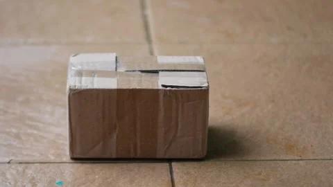 Drop a box or small package Stock Footage 327788204