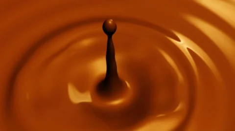 Drop of chocolate macro with the focus effect HD video (slow motion) Stock Footage 55336928