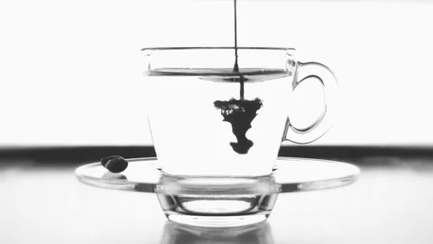 Drop in coffee cup on white background Video stock 107151570