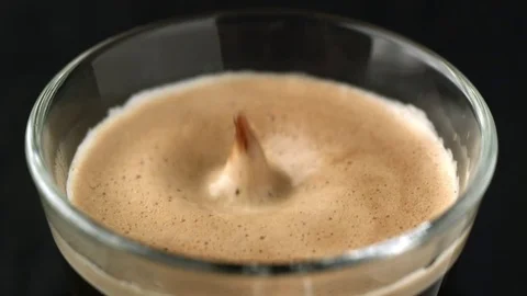  Drop of coffee fall on espresso Video stock 81807140