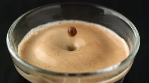  Drop of coffee fall on espresso Video stock 81807165
