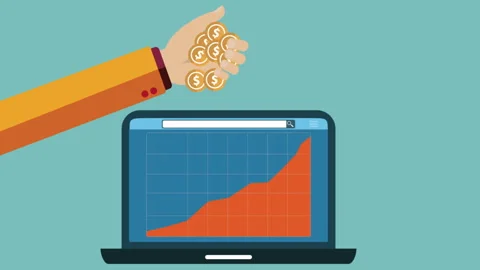 Drop Coin and Laptop Displaying Growth Chart Stock-Footage 333339344