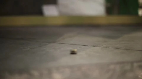 Drop a coin mans hand picks up a coin Stock Footage 49998137