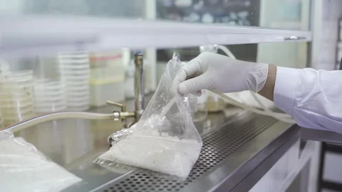 Drop concentrate solution on rice fermentation laboratory 50fps Vídeos de archivo 247399734