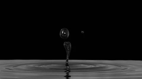 Drop of dark water macro with the focus effect (drop 2) on black background Stock Footage 56507990