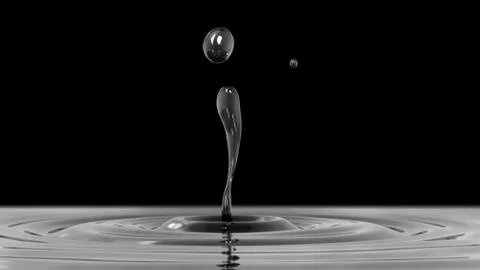 Drop of dark water macro with the focus effect (side view on black background Stock Illustration