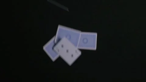 Drop a deck of playing cards on a black background. Stock Footage 207755698
