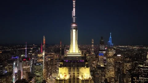 Drop down revealing the Lit Empire State Building Stock Footage 345289552