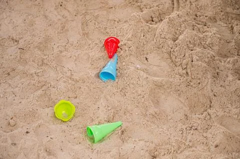 Drop down view of sand toys on beach. Stock Photos