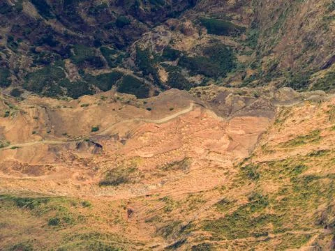 Drop down view of trail following volcanic mountain ridge. Stock Photos