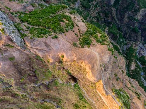 Drop down view of trail following volcanic mountain ridge. Stock Photos