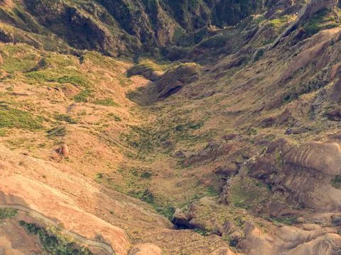 Drop down view of trail following volcanic mountain ridge. Stock Photos