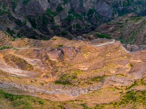 Drop down view of trail following volcanic mountain ridge. Stock Photos
