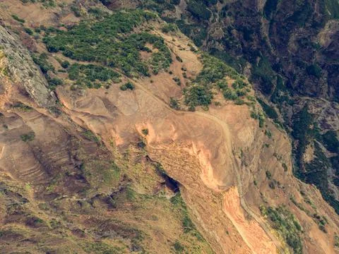 Drop down view of trail following volcanic mountain ridge. Stock Photos