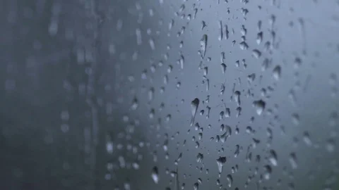 A drop drips down the glass Stock Footage 76430655