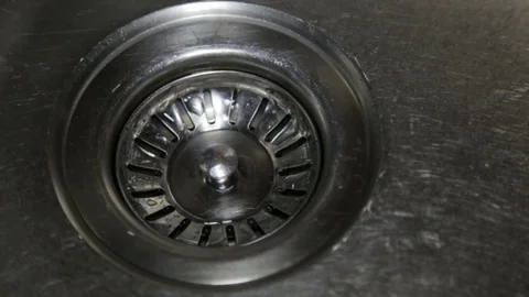 Drop drop in the kitchen sink Stock Footage 82067298