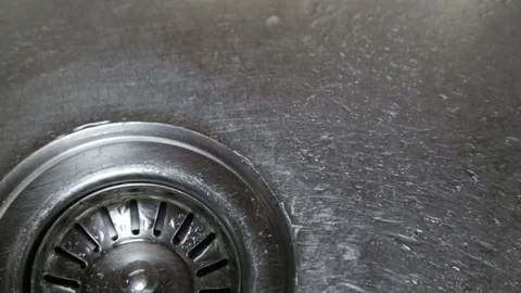 Drop drop in the kitchen sink Stock Footage 82069199