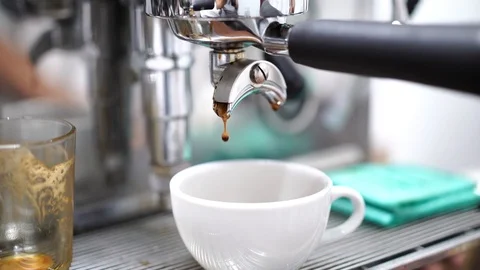 Drop of espresso coffee from machine, slow motion Stock Footage 93118502
