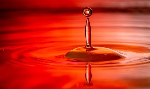 Drop falling down red Stock Photos