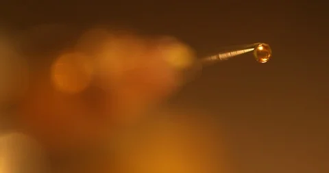 Drop falling from injection syringe Stock Footage 91998923